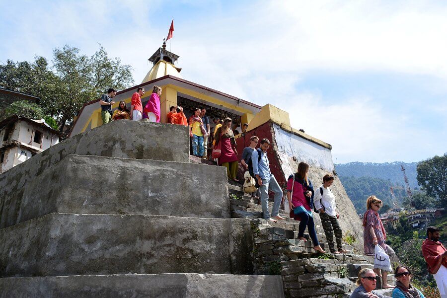 Western pilgrims visiting a temple in Rudraprayag, Himalayas, India
