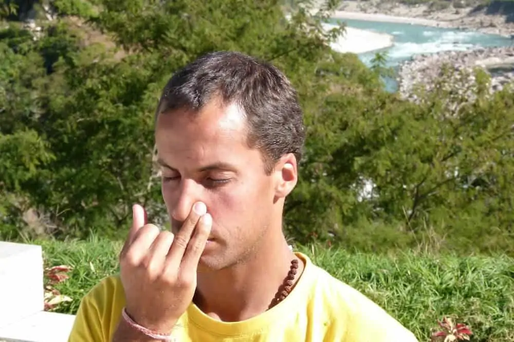 Pranayama with the Ganges River in the backgroud
