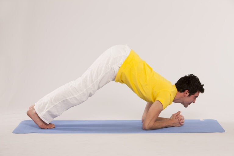 Step 2 of Dolphin Pose