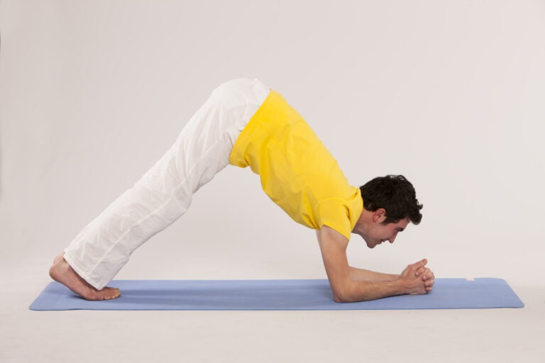 Step 4 of Dolphin Pose