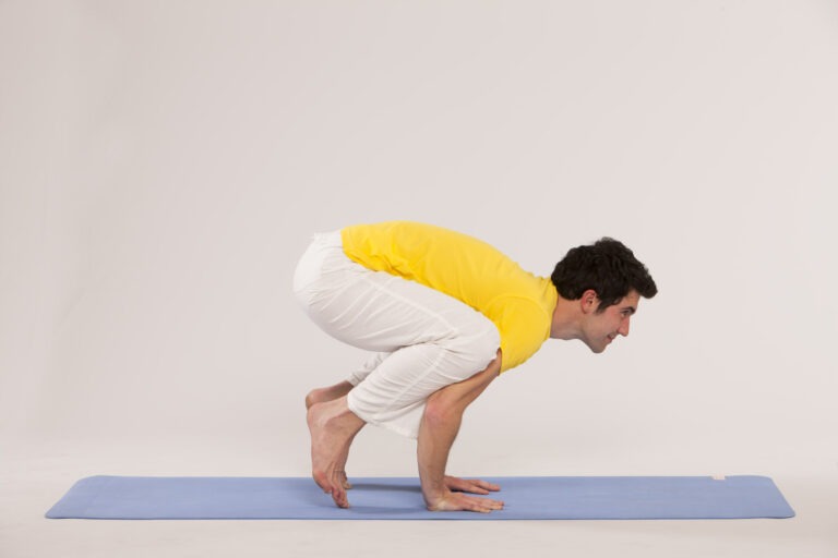 Coming onto toes in Crow pose