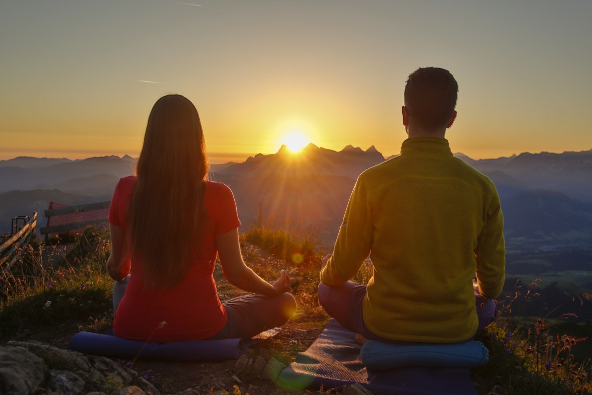 Meditation at sunset in the Alps