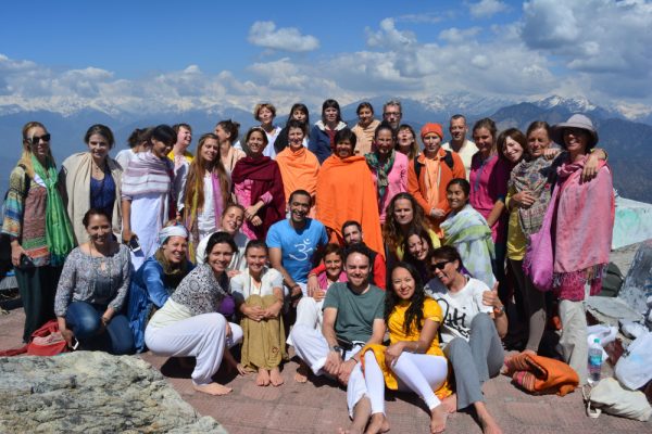 Group photo of yoga teacher training students in the Himalayas